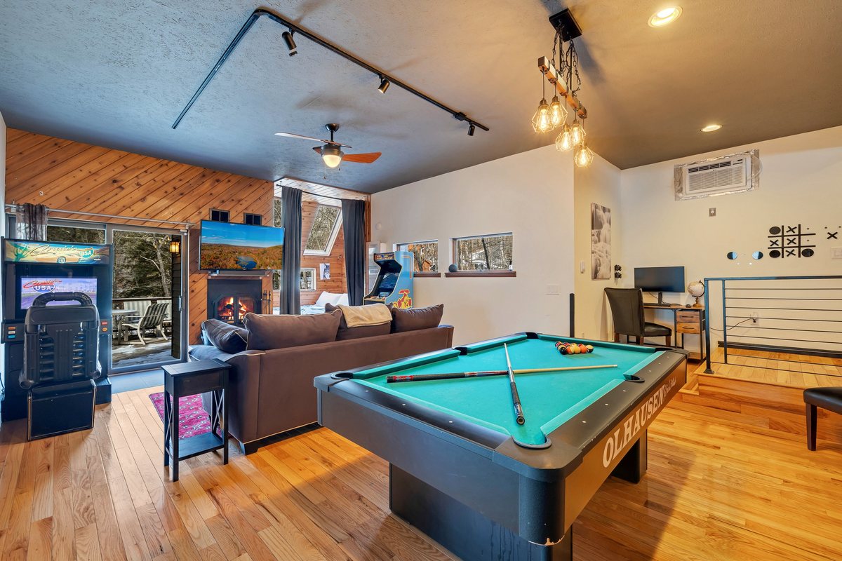 Game room at Waterfall Wonder set up for families and group downtime.